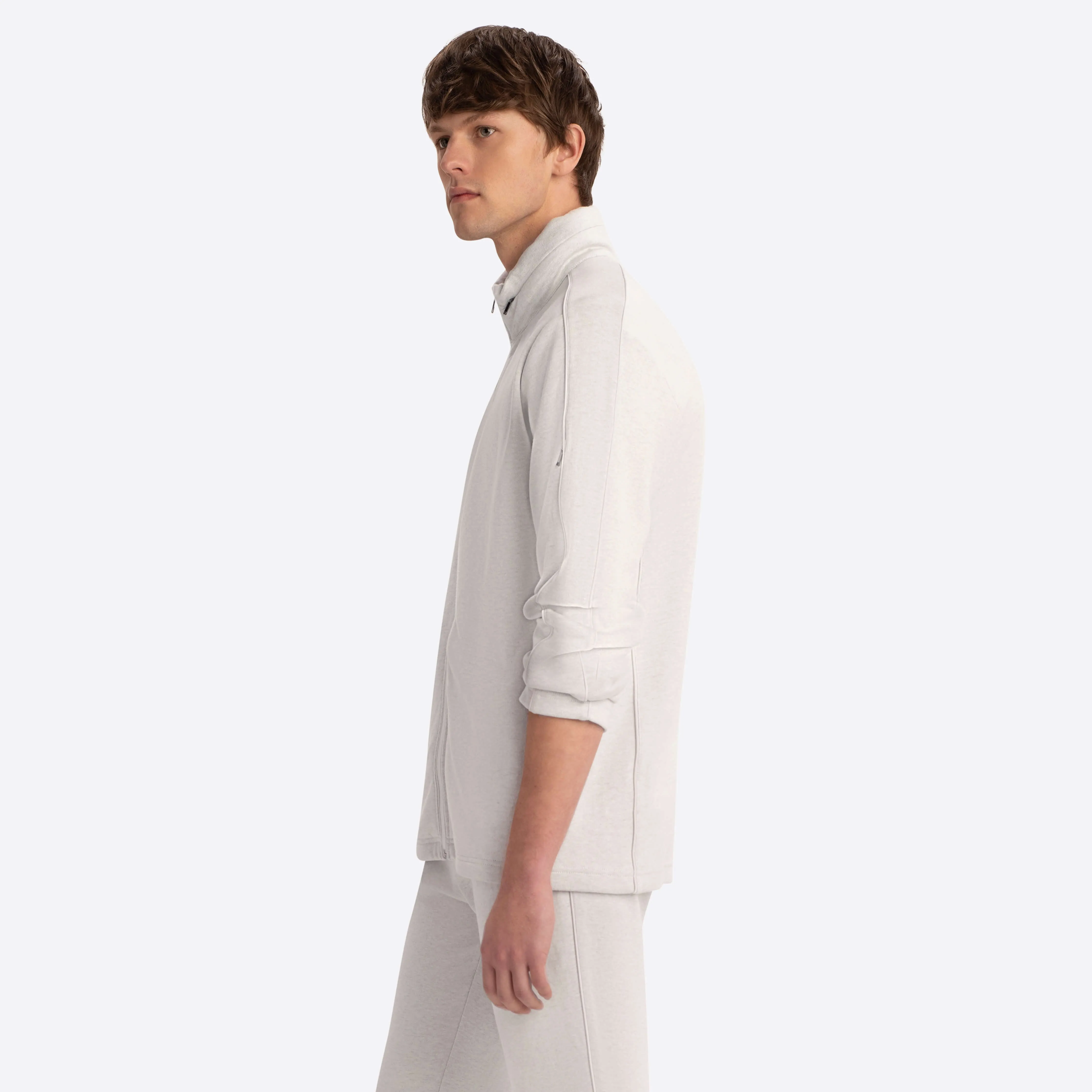 Full Zip Mock Neck Sweatshirt with Stow-Away Hood.